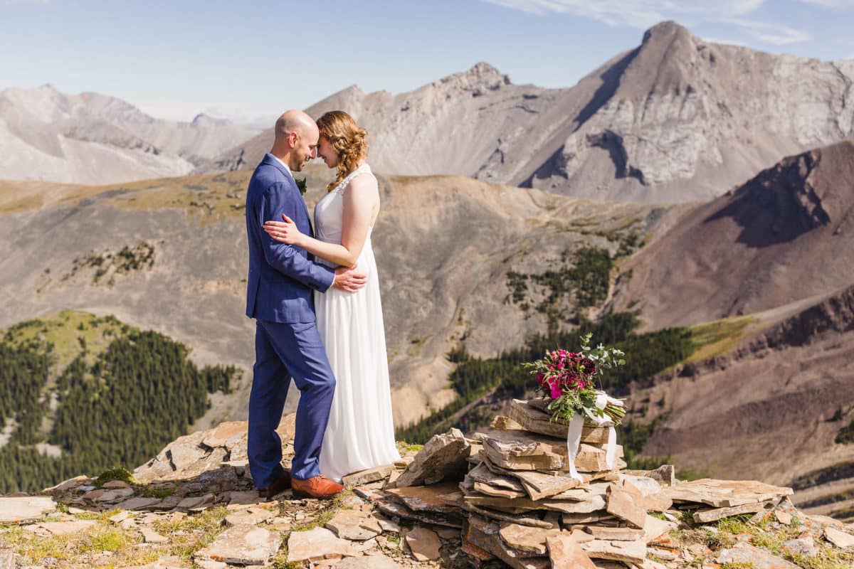 Helicopter mountaintop wedding in Canmore Parks Canada Canadian Rocky Mountain wedding elopement